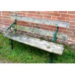 A Painted Wrought Iron Garden Bench with slated back and seat 145cm long