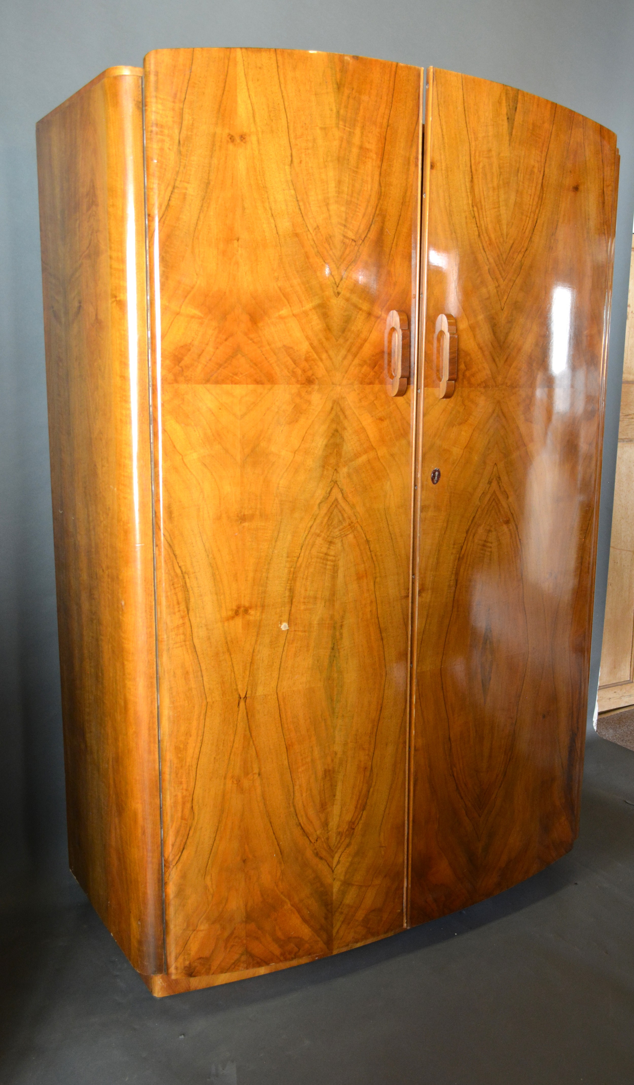 An Art Deco Walnut Bedroom Suite comprising dressing table, two wardrobes and a bedstead - Image 2 of 4