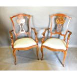 A Pair of Edwardian Mahogany and Marquetry Inlaid Drawing Room Armchairs each with a pierced splat