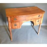 An Early 19th Century Mahogany Bow-Fronted Side Cabinet with three drawers, circular brass handles