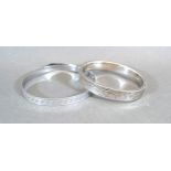 A Jack Spencer silver bangle together with another bangle