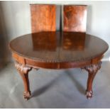 A Circa 1920's Mahogany Extending Dining Table, the moulded top above a plain frieze raised upon