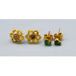 A Pair Of Yellow Metal Emerald Set Ear Studs Of Heart Form together with a pair of similar diamond