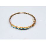 A 9ct Gold Bangle Set Turquoise and Pearls