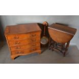 A Serpentine Fronted Chest Of Drawers, the moulded top above four drawers with brass drop handles