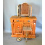 A Victorian Walnut Chiffonier together with a triple folding dressing table mirror, a brass stick