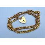 A 9ct. Gold Curb Link Watch Chain With Padlock Clasp converted to bracelet, 18.3 gms