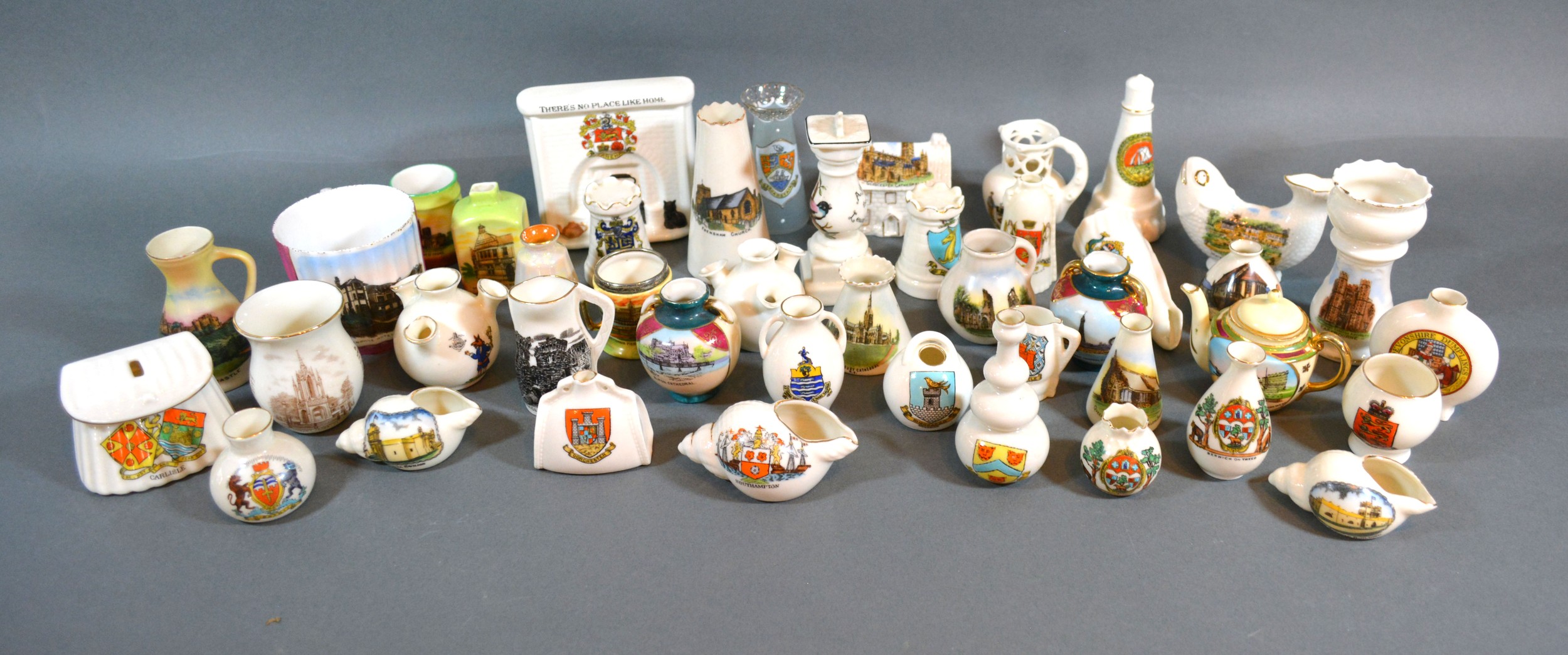 A Collection of Crested Ceramics to include W.H. Goss, Arcadian and others