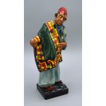 A Royal Doulton Figure 'Carpet Seller' HN1464 together with A Royal Doulton Figure 'The Shepherd'