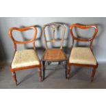 A Victorian Ebonised Side Chair with mother of pearl inlays and gilt decoration with cane seat