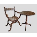A Carved Oak Crossover Armchair together with a 19th Century Oak Pedestal Table