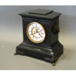 A Victorian Black Slate Mantle Clock, the enamel dial with Roman numerals and visible escapement