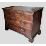A 19th Century Oak Chest, the moulded top above two short and two long drawers with brass handles