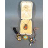 A Paste Set Pendant with chain in original box together with an enamel pendant, a turquoise set
