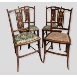 A Set Of Four Art Nouveau Mahogany Inlaid Side Chairs, each with a tulip inlaid back raised upon