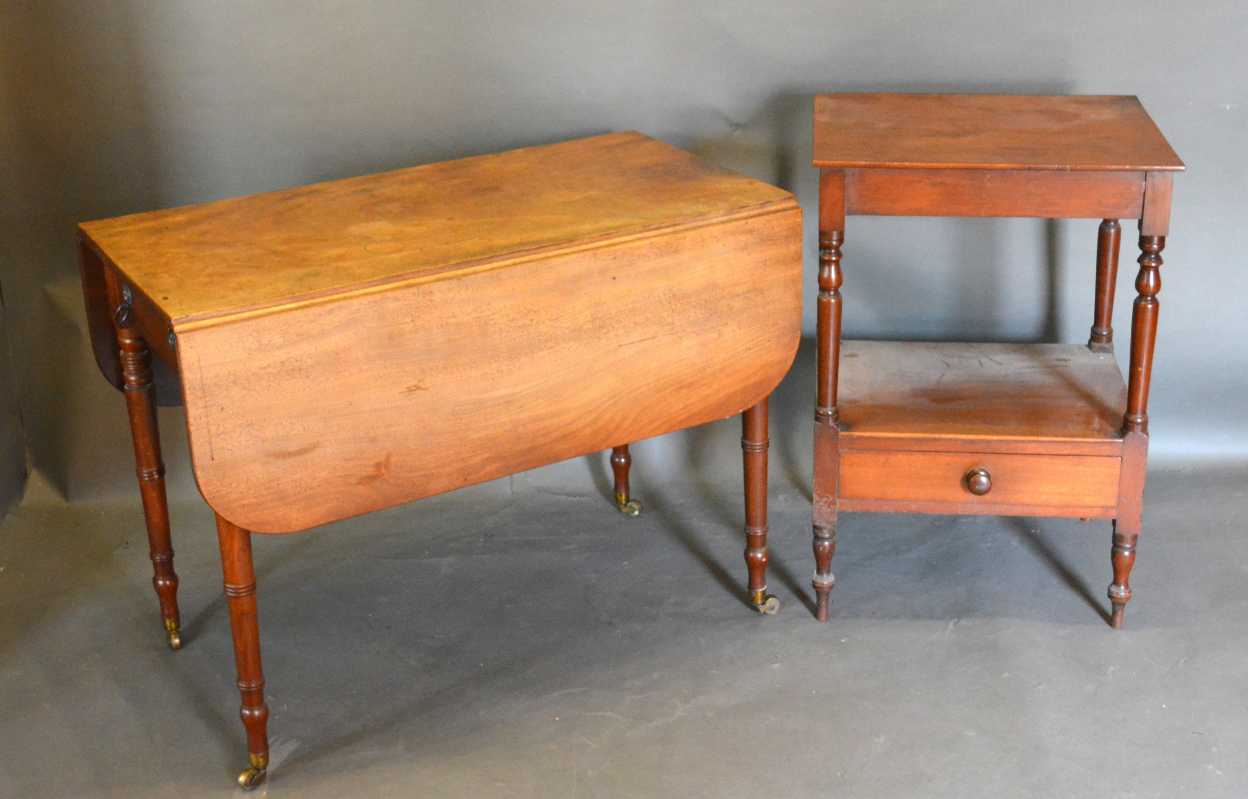 A Regency Mahogany Pembroke Table together with a Victorian mahogany whatnot