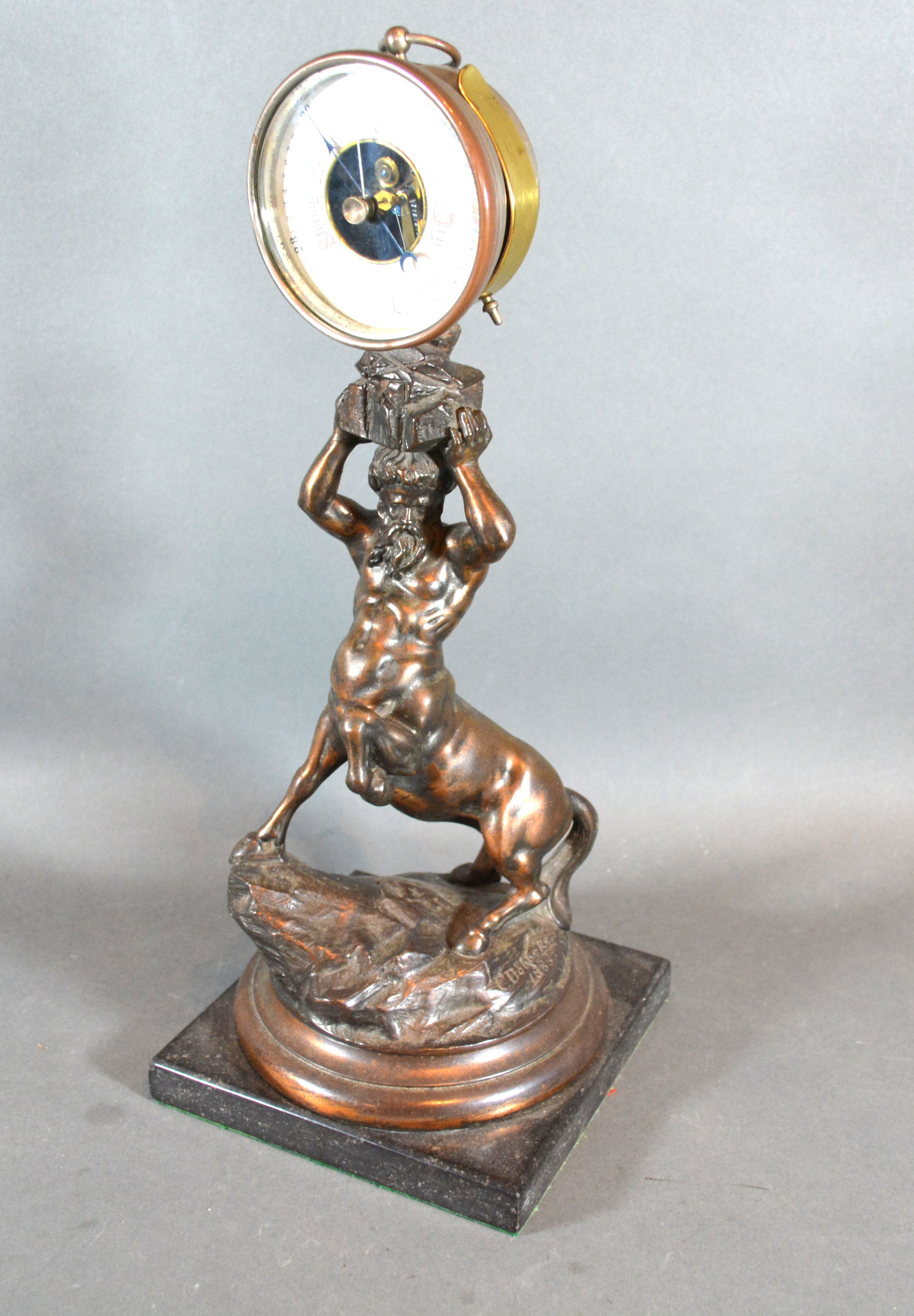 A 19th Century Patinated Spelter Figure With Brass Barometer, 38 cms tall