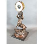 A 19th Century Patinated Spelter Figure With Brass Barometer, 38 cms tall