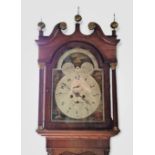 A 19th Century Oak And Mahogany Long Case Clock, the arched hood with swan neck pediment and brass