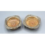 A Pair Of Victorian Silver And Turned Wooden Bottle Coasters, London 1897, 10cms diameter