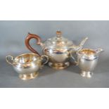 A Birmingham Silver Three Piece Tea Service comprising teapot, two handled sucrier, cream jug, 28
