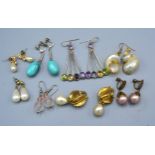 A Pair of Drop Earrings set multiple stones together with a small collection of other earrings and
