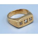 A Yellow Metal Dress Ring set three diamonds, 16.7gms, ring size V