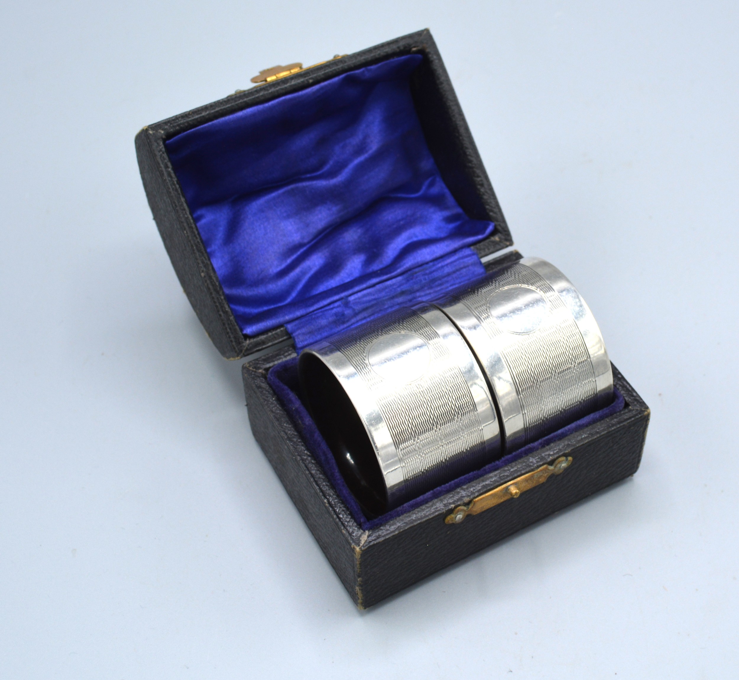 A Pair Of Birmingham Silver Napkin Rings with fitted case