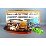 A Model Train 'Orient Express' by Lima together with a model boat 'Duchess of Kent' and a tin