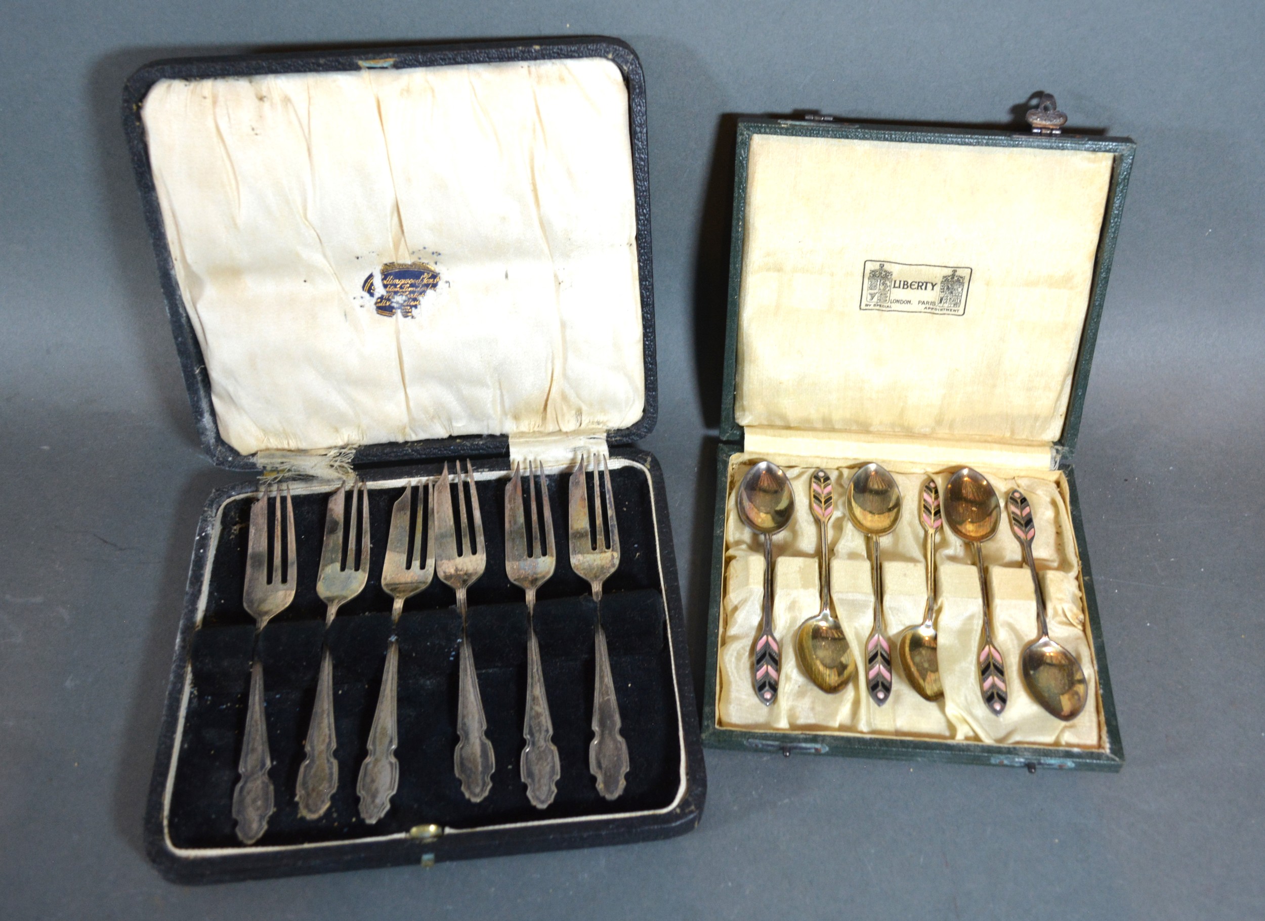 A Set of Six Birmingham Silver and Enamel Decorated Teaspoons from Liberty together with a set of