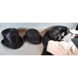 A Lincoln Bennett & Co. Top Hat together with a Lock & Co. Bowler Hat and a Moss Bros. & Co. Suit