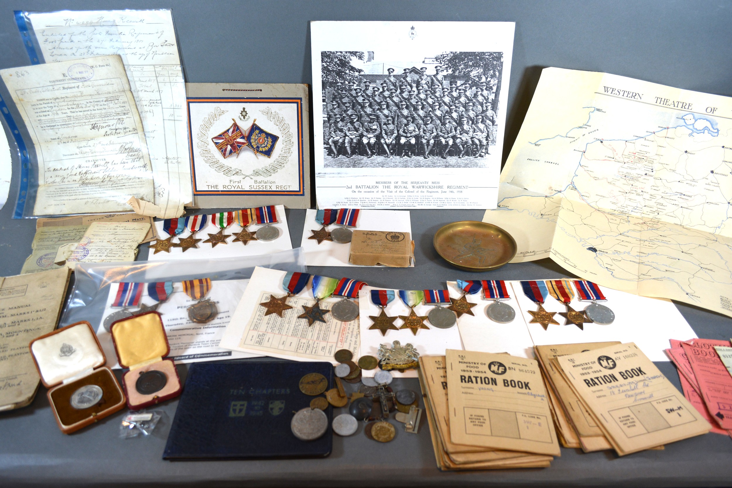 A Collection Of World War II Medal Groups together with various related medallions and ephemera