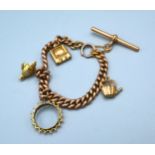 A 9ct. Gold Charm Bracelet with Albert Bar 28.9 gms