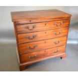A 19th Century Mahogany Straight Front Chest, the moulded top above a brushing slide and four long