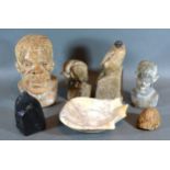 A Soap Stone Carving in the form of a Bird together with another similar two carved stone busts, a