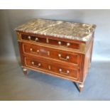 A 19th Century Mahogany French Commode, the variegated marble top above three drawers with brass