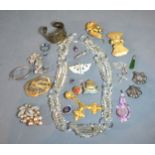 A Collection of Jewellery to include a glass necklace, various brooches and other items