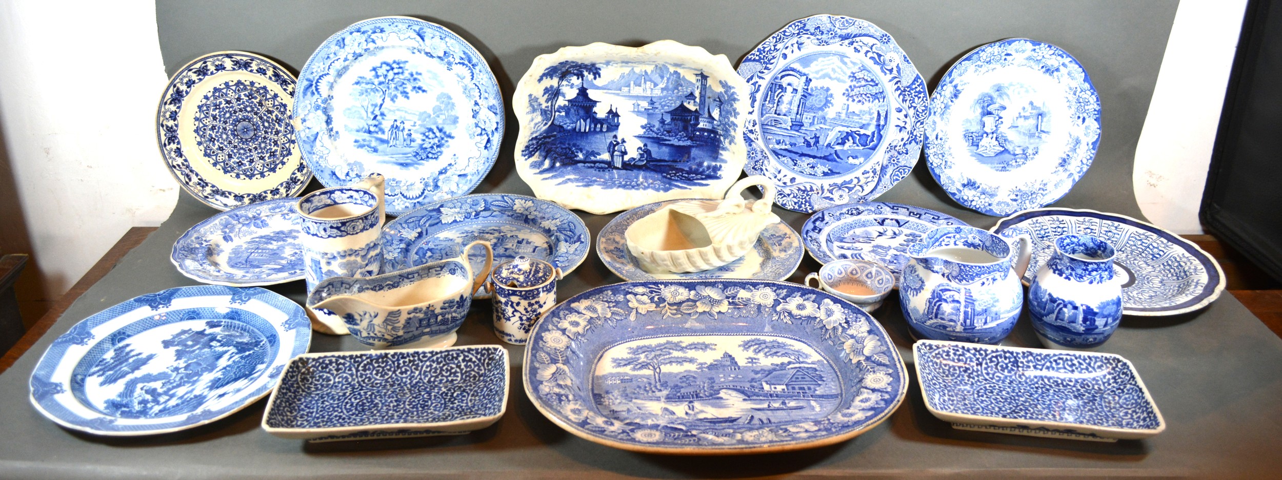 An Early English Blue and White Decorated Meat Platter together with a collection of other similar