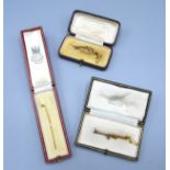 A 9ct. Gold Bar Brooch within fitted case together with another similar pearl set bar brooch in case