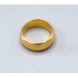 An 18ct. Gold Wedding Band 14.1 gms