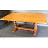 Robert (Mouseman) Thompson, An Oak Refectory Dining Table, the adze carved top above twin end