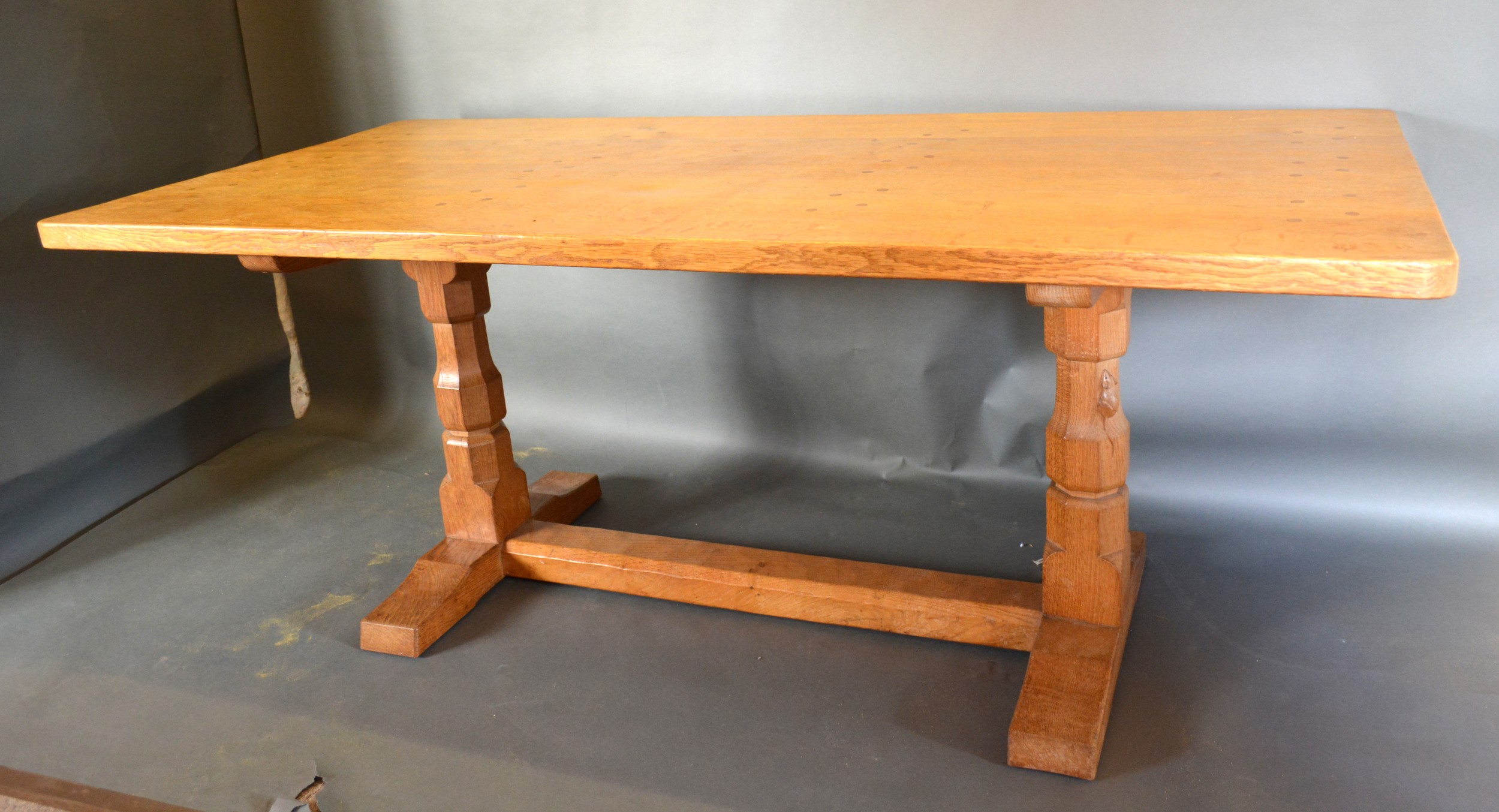 Robert (Mouseman) Thompson, An Oak Refectory Dining Table, the adze carved top above twin end - Image 3 of 3