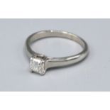 A Tiffany & Co. Lucida Platinum Solitaire Diamond Ring set with square diamond 0.52ct. dated 1999