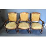 A Set Of Three 19th Century French Open Armchairs, each with an upholstered back and seat with