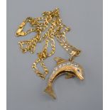 A 9ct Gold Dolphin Pendant Set Paste Stones, toghter with a 9ct gold linked neck chain 22.9g