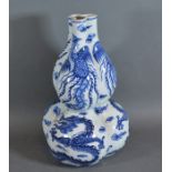 A 19th Century Chines porcelain Gourd vase of triform decorated in undeglaze blue with serpents,