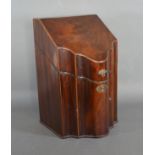 A Regency mahogany serpentine knife box converted to correspondence, 33cms tall