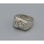 A Platinum and diamond set rin in the form of a buckle, set with two diamonds surrounded by