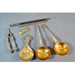 A Pair Of Victorian Silver Gilt Apostle Spoons, Birmingham 1891 together with another similar spoon,