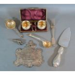 A Sterling silver handled knife together with a silver presentation plaque, a pair of salts and